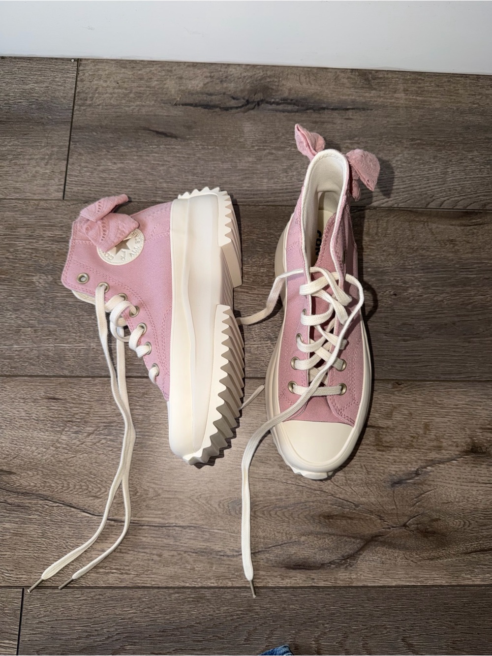 Pink Converse High-Top Platform Sneakers with Bow Accent